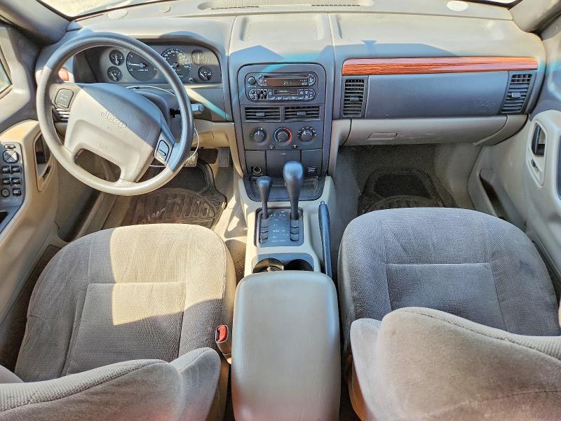 1999 Jeep Grand cherokee VIN 1J4GW58S5XC687799 COPART salvage auction — MINOR DENT/SCRATCHES, CA - DIS/DLR/EXP ONLY CLEAN TITLE, sold $1,500 on 2026-09-01 (photo 8)
