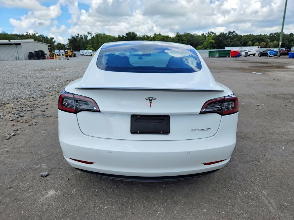 2021 Tesla Model 3 VIN 5YJ3E1EC2MF926480 COPART salvage auction — MINOR DENT/SCRATCHES, Fl - Cert Of Title-Rebuilt, sold $10,000 on 2026-08-28 (photo 6)
