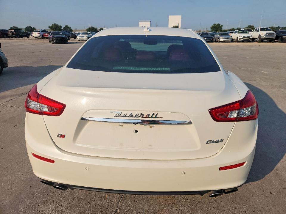 2014 Maserati Ghibli VIN ZAM57RTA7E1105755 COPART salvage auction — MINOR DENT/SCRATCHES, La - Certificate Of Title, sold $3,500 on 2026-08-19 (photo 6)