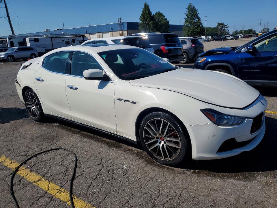 2015 Maserati Ghibli VIN ZAM57RTA5F1133376 COPART salvage auction — REAR END, Salvage Title, sold $2,250 on 2026-09-04 (photo 4)