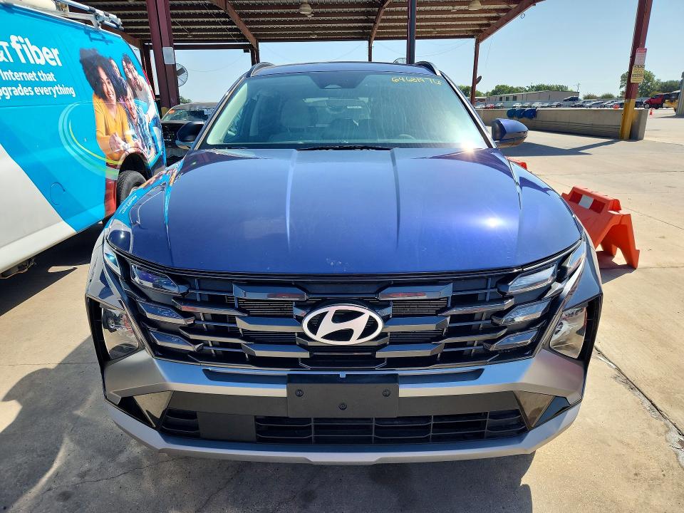2026 Hyundai Tucson VIN 5NMJBCDE0TH640090 COPART salvage auction — SIDE, Tx - Nonrepairable Title, sold $9,300 on 2026-09-17 (photo 5)