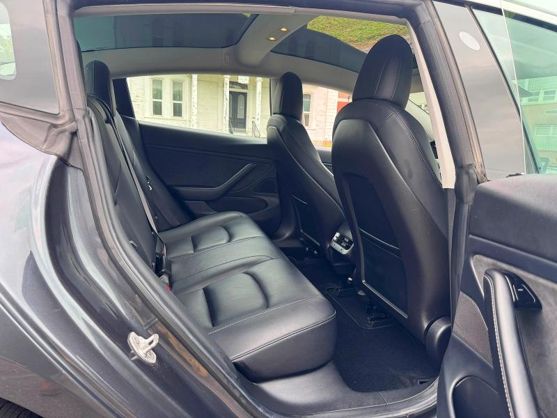 2018 Tesla Model 3 VIN 5YJ3E1EB6JF054422 COPART salvage auction — NORMAL WEAR, MA - CERTIFICATE OF TITLE (P), sold $10,500 on 2026-08-27 (photo 6)