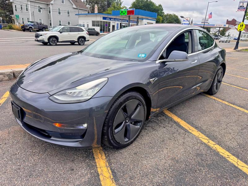2018 Tesla Model 3 VIN 5YJ3E1EB6JF054422 COPART salvage auction — NORMAL WEAR, MA - CERTIFICATE OF TITLE (P), sold $10,500 on 2026-08-27 (photo 2)
