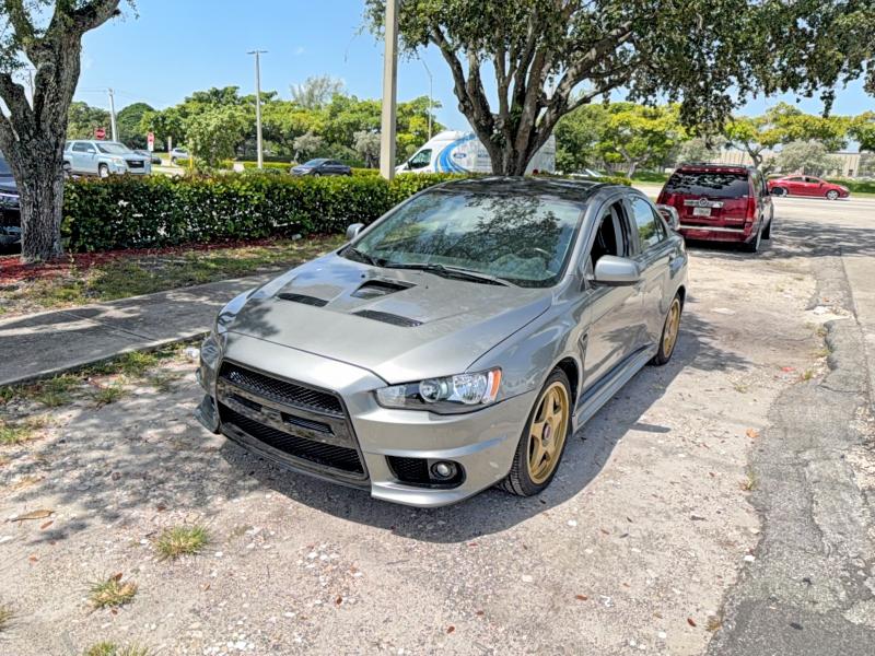 2012 Mitsubishi Lancer evolution VIN JA32W8FV7CU010819 COPART salvage auction — NORMAL WEAR, Fl - Cert Of Title Slvg Rebuildable (P), sold $9,100 on 2026-09-16 (photo 2)
