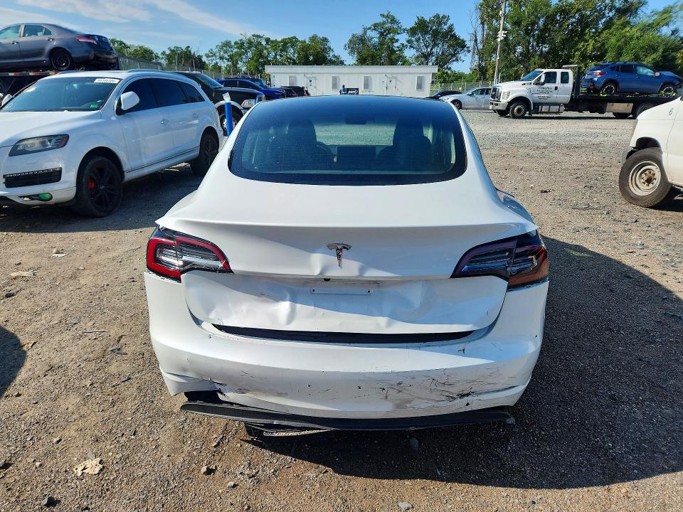2023 Tesla Model 3 VIN 5YJ3E1EA7PF437687 COPART salvage auction — REAR END, Fl - Certificate Of Destruction, sold $11,600 on 2026-09-22 (photo 6)
