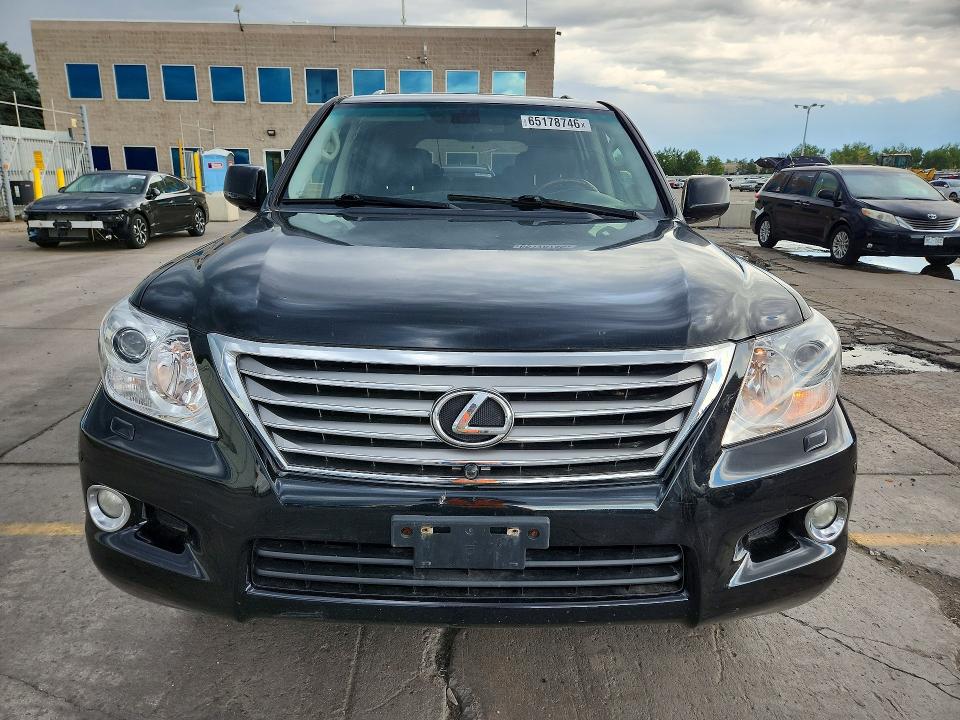 2011 Lexus Lx 570 VIN JTJHY7AX6B4064116 COPART salvage auction — MINOR DENT/SCRATCHES, CO - CERTIFICATE OF TITLE, sold $10,900 on 2026-08-26 (photo 5)