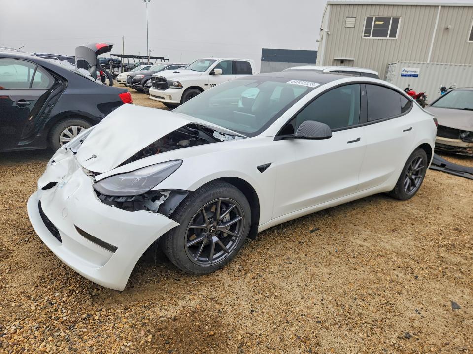 2023 Tesla Model 3 VIN LRW3E1FA0PC871958 — COPART salvage auction photo