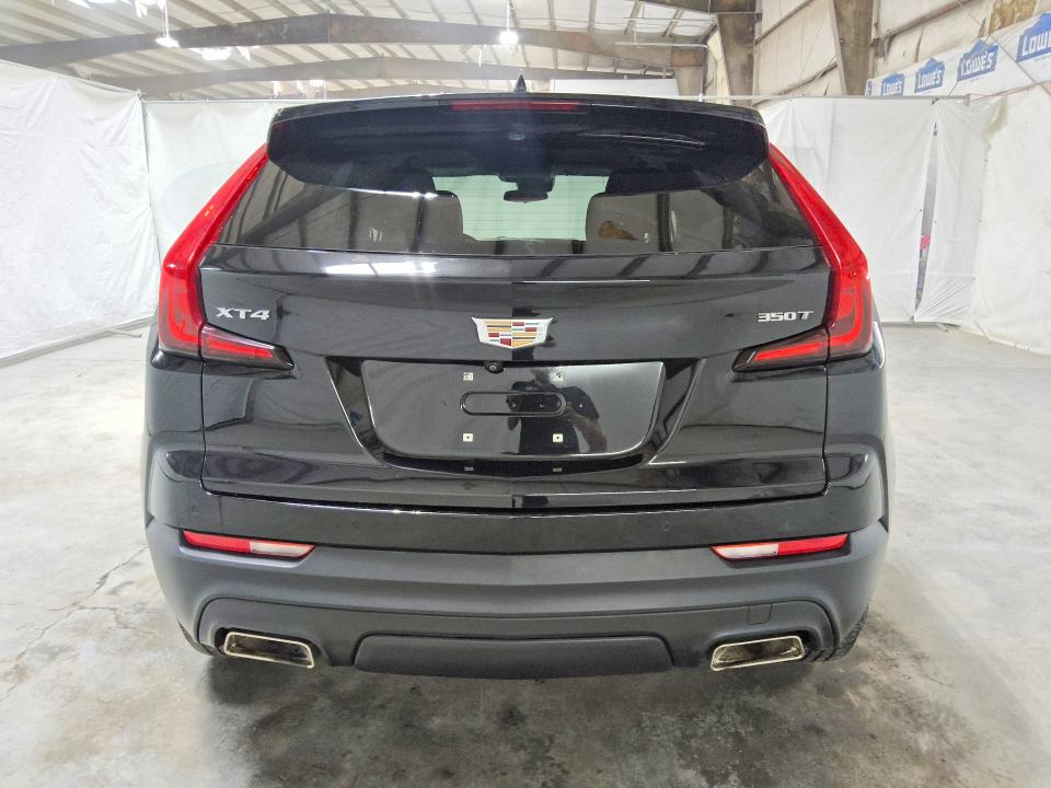 2023 Cadillac Xt4 VIN 1GYAZAR49PF107913 COPART salvage auction — MINOR DENT/SCRATCHES, TN - CERTIFICATE OF TITLE, sold $14,300 on 2026-08-20 (photo 6)