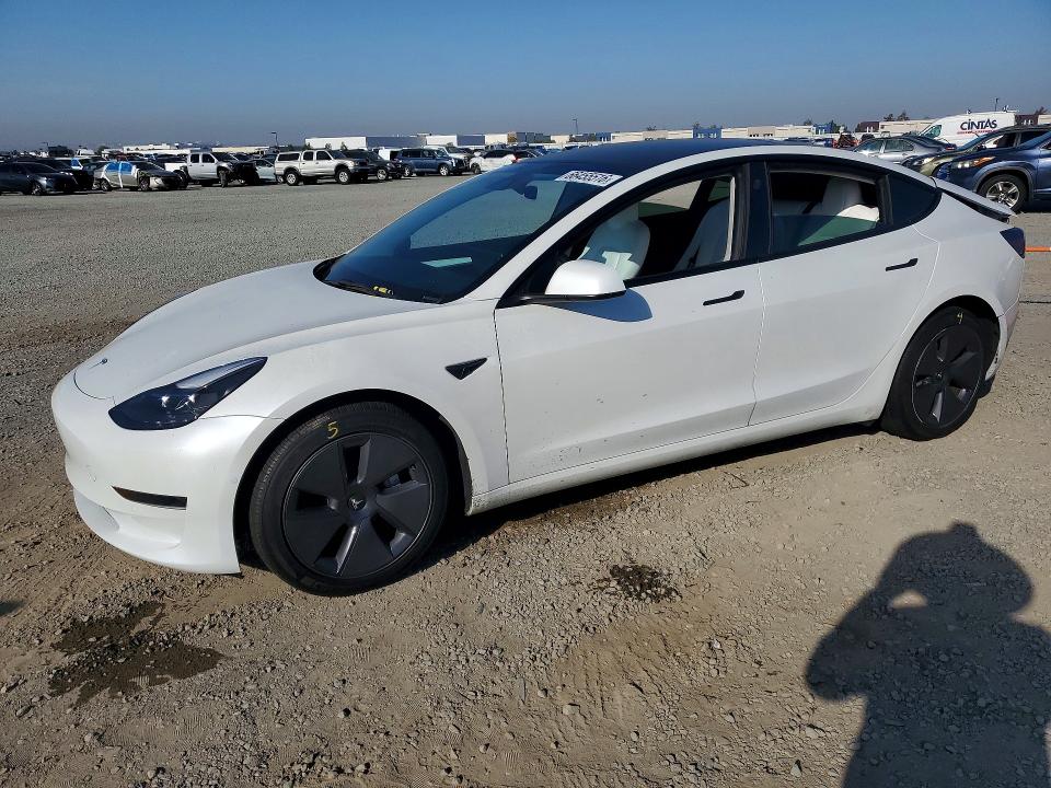 2022 Tesla Model 3 VIN 5YJ3E1EA9NF357661 — COPART salvage auction photo