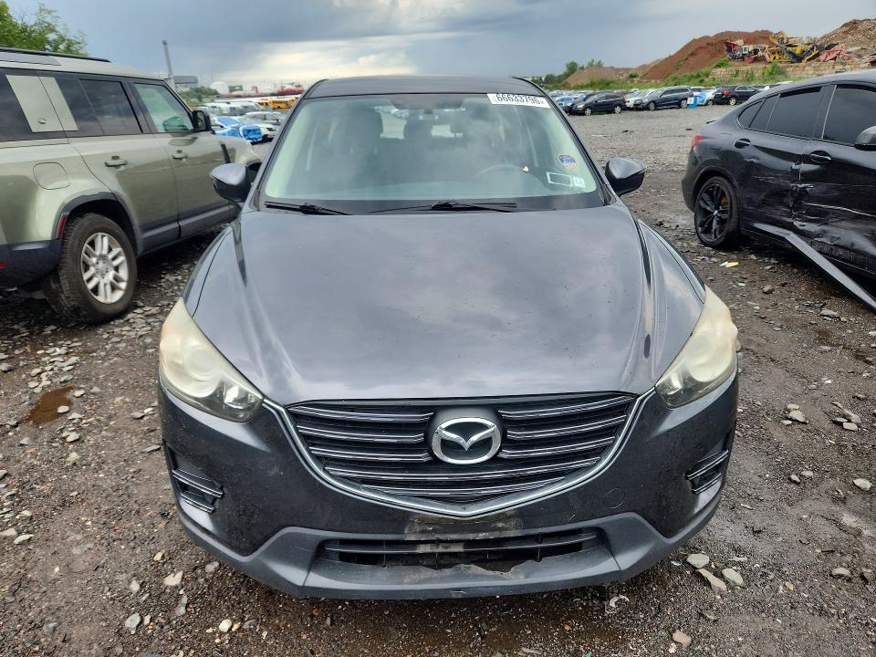 2016 Mazda CX-5 VIN JM3KE4BY9G0601574 COPART salvage auction — REAR END, Ny - Mv-907A Salvage Certificate, sold $1,850 on 2026-09-10 (photo 5)