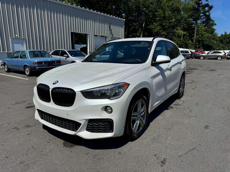 2018 BMW X1 VIN WBXHU7C33J5L09376 — COPART salvage auction photo