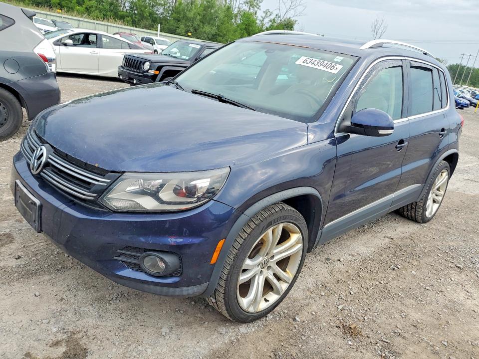 2013 Volkswagen Tiguan VIN WVGBV3AXXDW561117 COPART salvage auction — NORMAL WEAR, Co - Certificate Of Title, sold $1,641 on 2026-08-17 (photo 1)