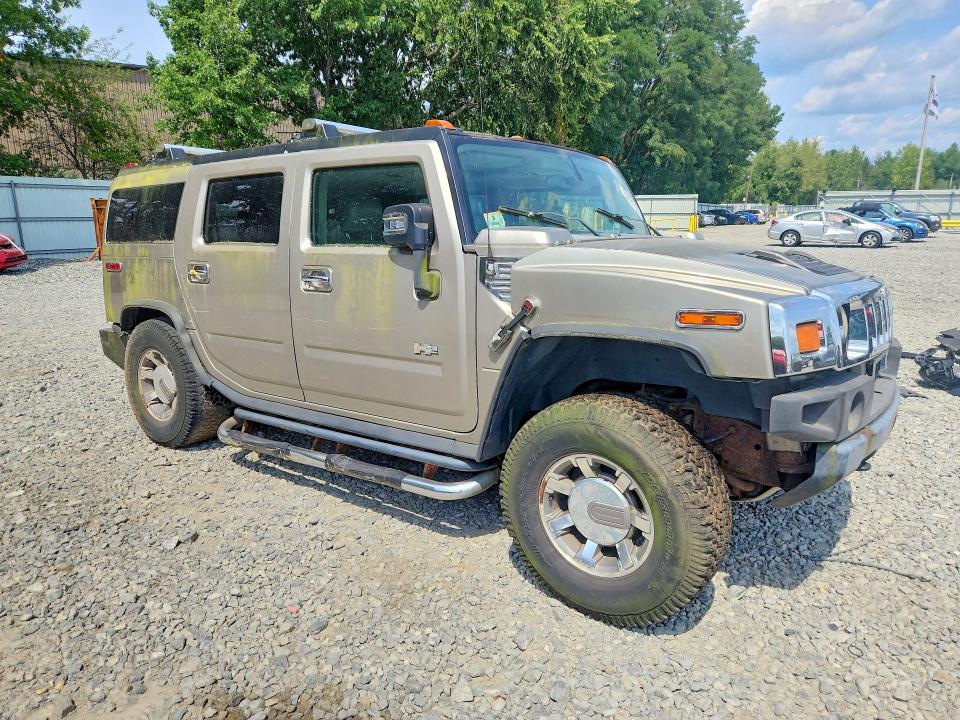 2004 Hummer H2 VIN 5GRGN23U64H117419 COPART salvage auction — MINOR DENT/SCRATCHES, MA - CERTIFICATE OF TITLE, sold $1,500 on 2026-09-15 (photo 4)