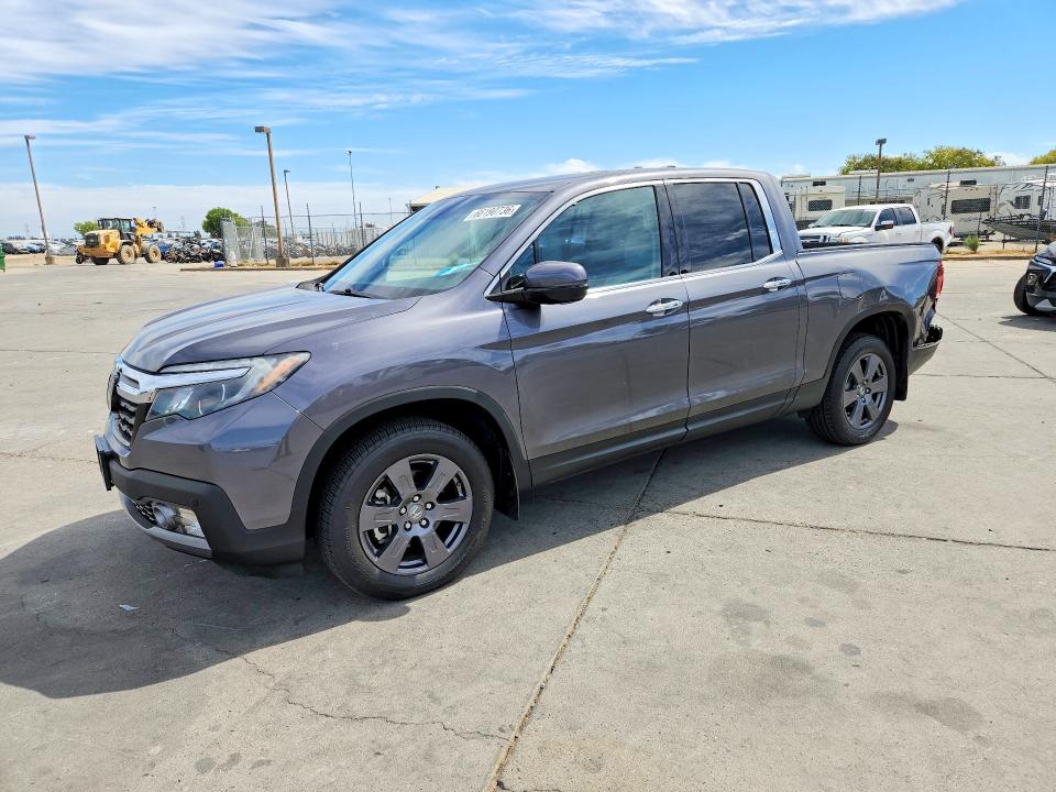 2020 Honda Ridgeline VIN 5FPYK3F77LB022173 — COPART salvage auction photo