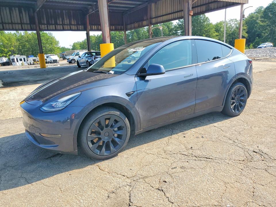 2023 Tesla Model y VIN 7SAYGDEE2PA027741 COPART salvage auction — SIDE, Nj - Certificate Of Title (P), sold $22,750 on 2026-09-22 (photo 1)