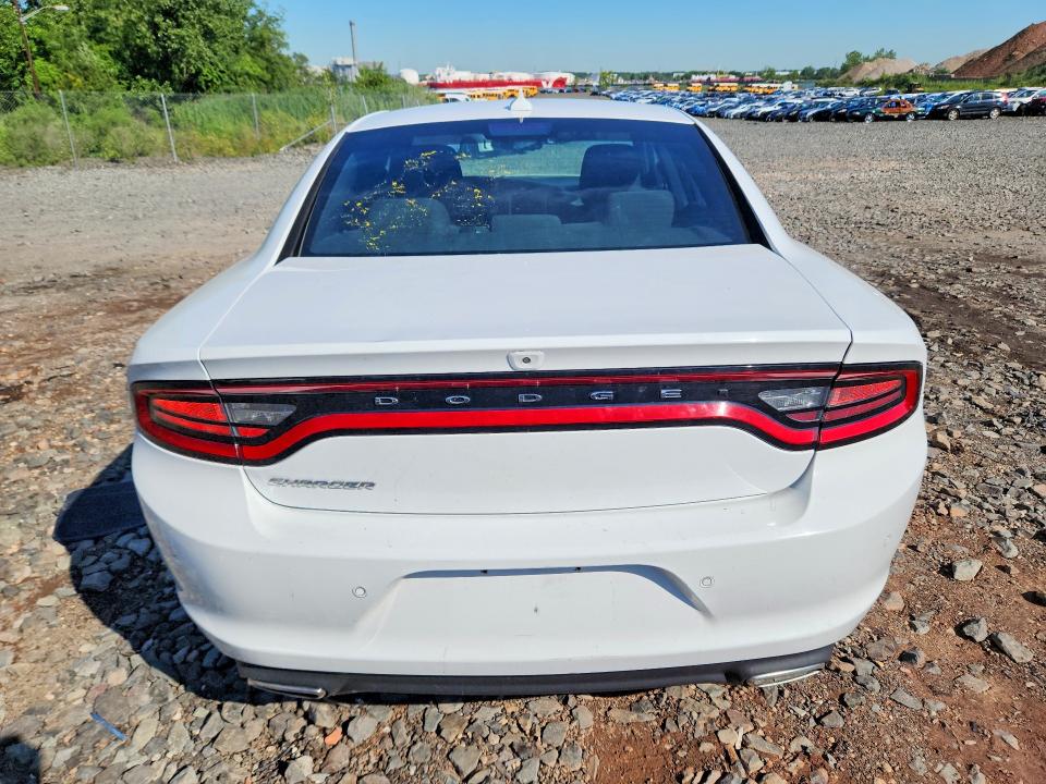 2023 Dodge Charger VIN 2C3CDXBG7PH564307 COPART salvage auction — MINOR DENT/SCRATCHES, Wv - Certificate Of Title, sold $15,900 on 2026-09-01 (photo 6)