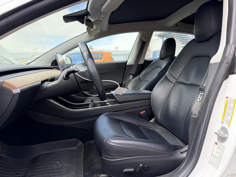 2018 Tesla Model 3 VIN 5YJ3E1EA1JF013218 COPART salvage auction — MINOR DENT/SCRATCHES, Ca - Certificate Of Title, sold $17,007 on 2026-09-01 (photo 7)
