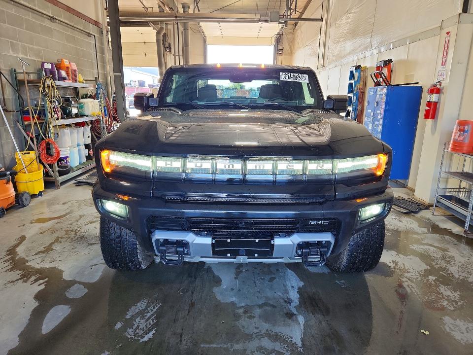 2025 Gmc Hummer pickup VIN 1GT40DDB3SU120102 COPART salvage auction — NORMAL WEAR, AK - CERTIFICATE OF VEHICLE TITLE, sold $70,000 on 2026-09-15 (photo 5)