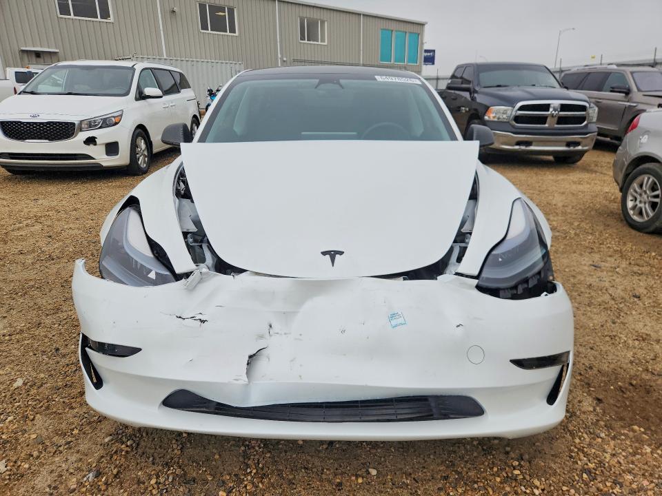 2023 Tesla Model 3 VIN LRW3E1FA0PC871958 COPART salvage auction — REAR END, Ab - Bos - Salvage, sold $9,800 on 2026-09-03 (photo 5)