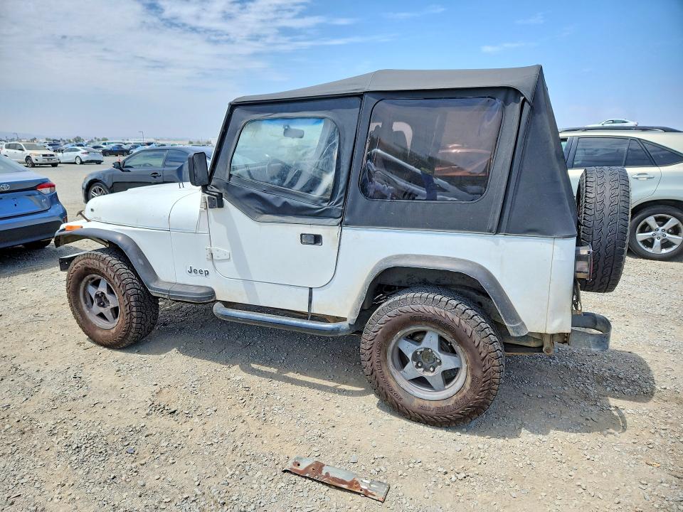 1993 Jeep Wrangler / VIN 1J4FY19P3PP219989 COPART salvage auction — FRONT END, CA - DIS/DLR/EXP ONLY CLEAN TITLE, sold $1,600 on 2026-08-21 (photo 2)