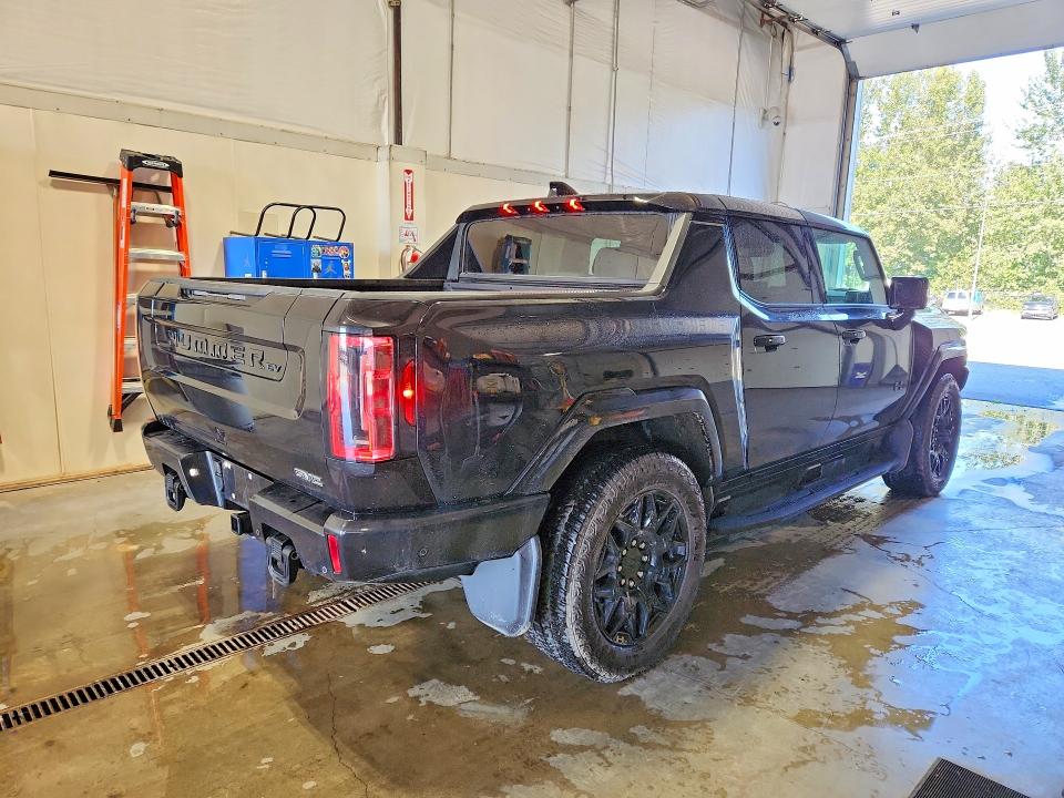 2025 Gmc Hummer pickup VIN 1GT40DDB3SU120102 COPART salvage auction — NORMAL WEAR, AK - CERTIFICATE OF VEHICLE TITLE, sold $70,000 on 2026-09-15 (photo 3)