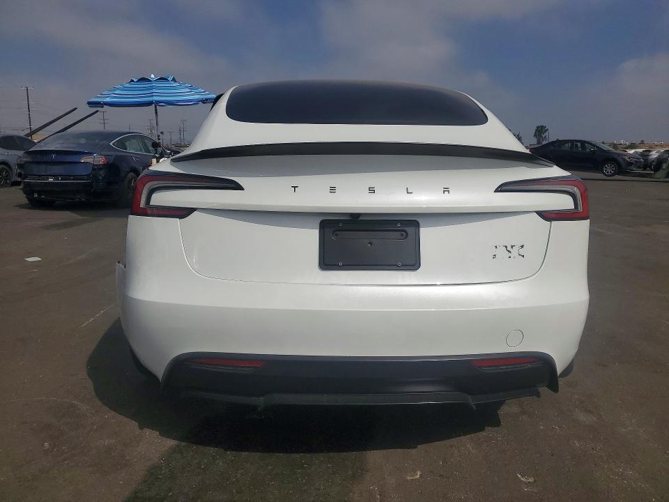 2026 Tesla Model 3 VIN 5YJ3E1ETXTF156382 COPART salvage auction — SIDE, CA - SALVAGE CERTIFICATE, sold $20,700 on 2026-09-21 (photo 6)