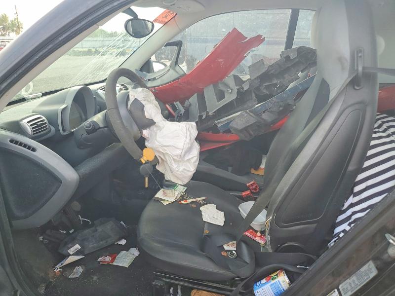 2009 Smart Fortwo VIN WMEEJ31X99K324468 COPART salvage auction — FRONT END, AZ - CERT OF TITLE - SALVAGE, sold $225 on 2026-09-11 (photo 7)