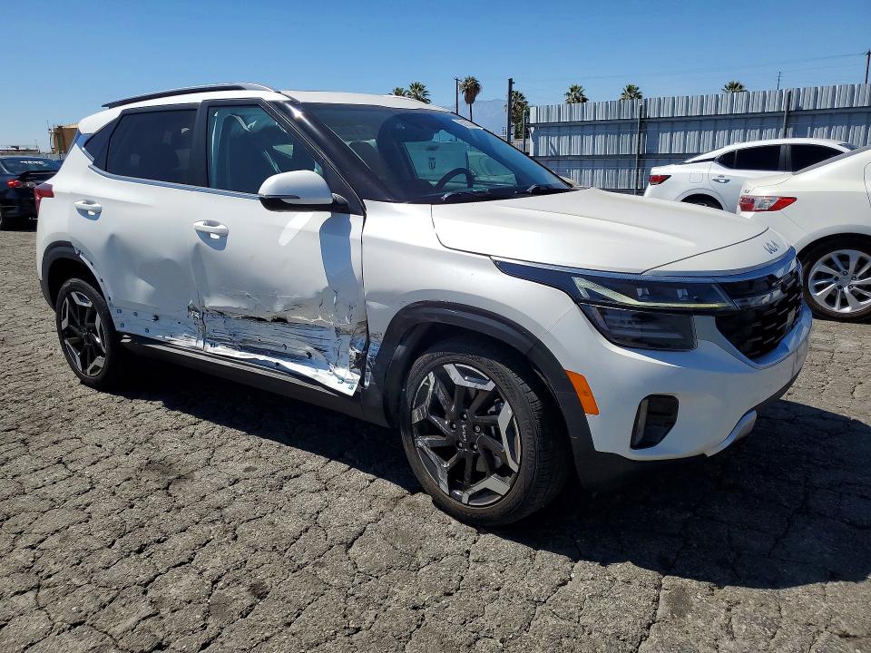 2024 Kia Seltos VIN KNDETCA79R7631618 COPART salvage auction — SIDE, Ca - Salvage Certificate, sold $5,500 on 2026-10-03 (photo 4)