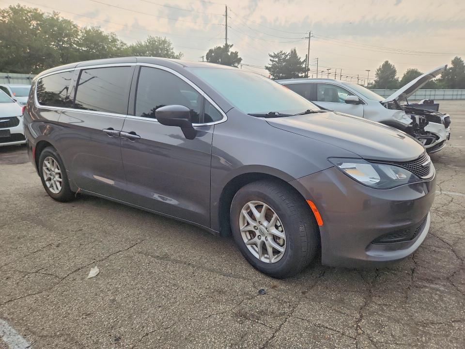 2023 Chrysler Voyager VIN 2C4RC1CG0PR610557 COPART salvage auction — WATER/FLOOD, Fl - Cert Of Title-Slvg Rebld Flood, sold $2,000 on 2026-09-16 (photo 4)