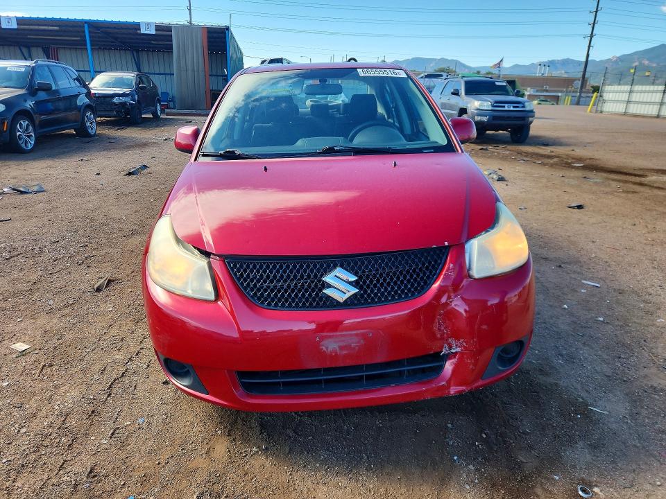 2013 Suzuki Sx4 VIN JS2YC5A39D6100395 COPART salvage auction — FRONT END, CO - SALVAGE TITLE, sold $550 on 2026-09-16 (photo 5)