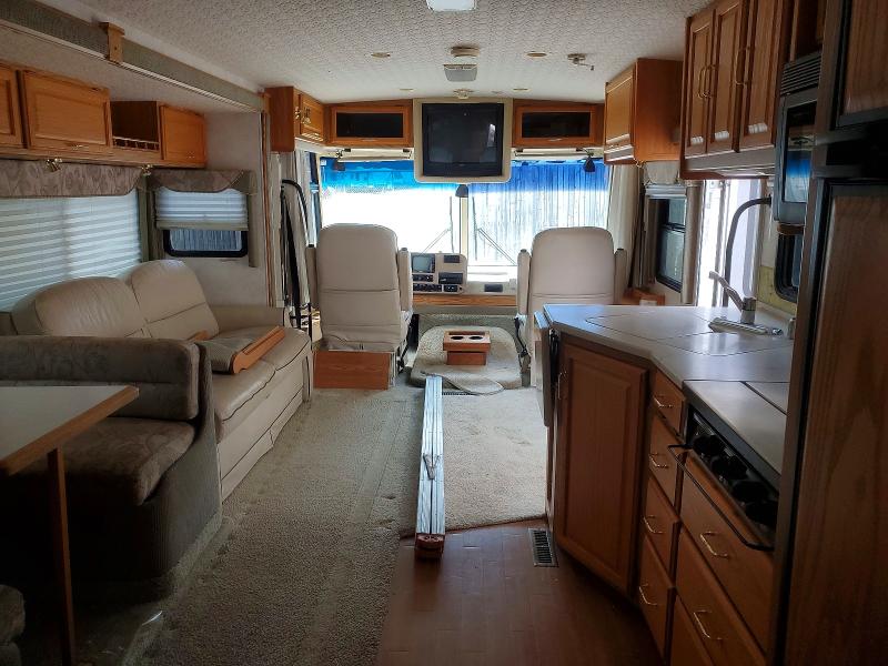 2003 Winnebago Adventurer VIN 5B4MP67G333361945 COPART salvage auction — REAR END, MN - CERT OF TITLE-SALVAGE FLOOD, sold $2,150 on 2026-10-01 (photo 5)