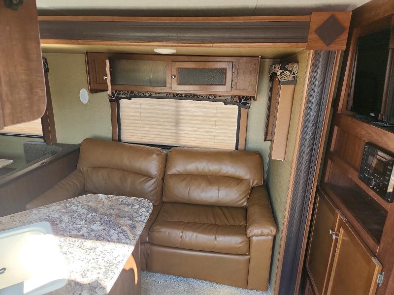 2016 Kutb VIN 4YDT28B27GN209279 COPART salvage auction — ROOF, WY - CERTIFICATE OF TITLE, sold $3,300 on 2026-09-11 (photo 5)