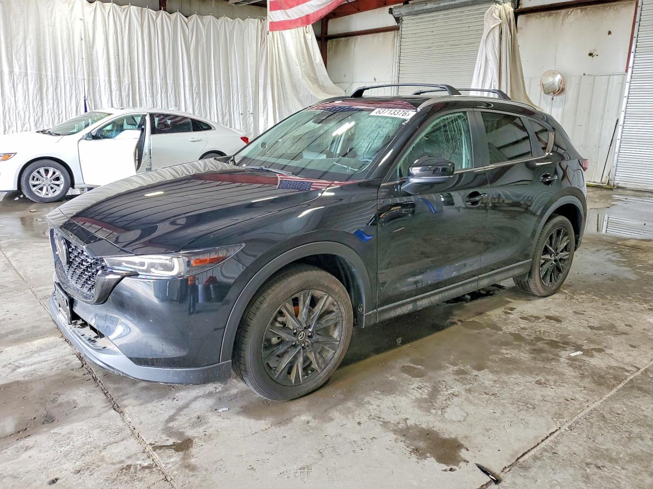2025 Mazda CX-5 VIN JM3KFBCM9S0734826 — COPART salvage auction photo