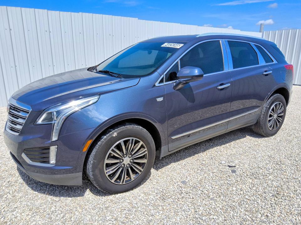 2018 Cadillac Xt5 VIN 1GYKNARS3JZ135162 COPART salvage auction — MINOR DENT/SCRATCHES, FL - CERTIFICATE OF TITLE, sold $8,300 on 2026-08-27 (photo 1)
