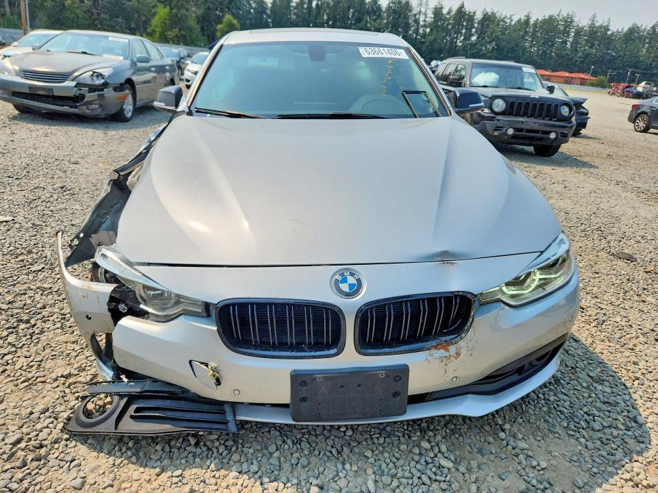 2018 BMW 3 series VIN WBA8E5G56JNV01754 COPART salvage auction — FRONT END, WA - BILL OF SALE, sold $1,300 on 2026-08-14 (photo 5)