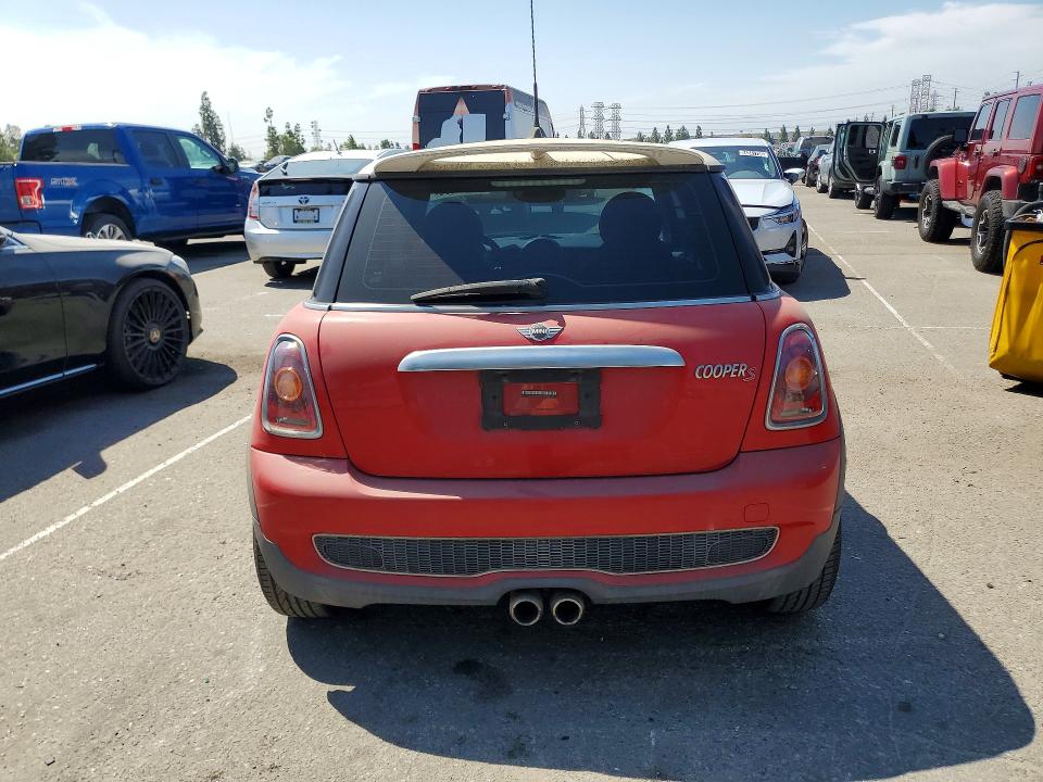 2009 Mini Cooper VIN WMWMF73569TT97366 COPART salvage auction — MINOR DENT/SCRATCHES, Ca - Dis/Dlr/Exp Only Clean Title, sold $300 on 2026-08-18 (photo 6)