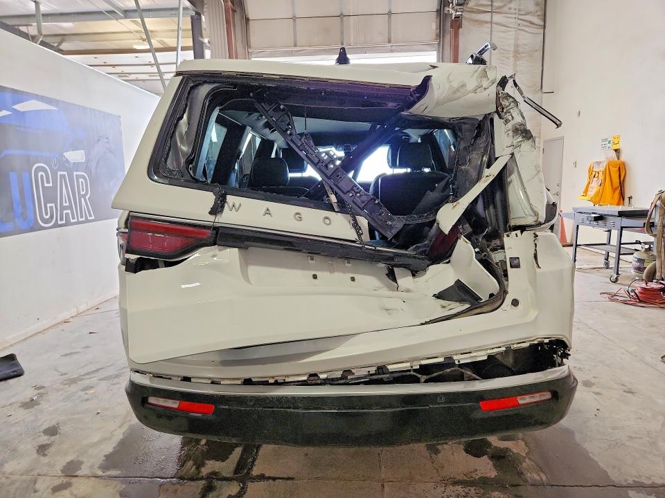 2025 Jeep Wagoneer VIN 1C4SJVBP8SS536294 COPART salvage auction — REAR END, MT - CERTIFICATE OF TITLE (P), sold $15,900 on 2026-08-26 (photo 6)