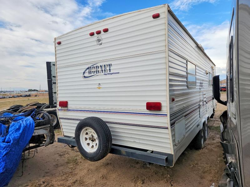 2002 Keystone Hornet VIN 4YDT27S2227305151 COPART salvage auction — VANDALISM, NM - CERT OF TITLE-SALVAGE, sold $650 on 2026-09-21 (photo 4)