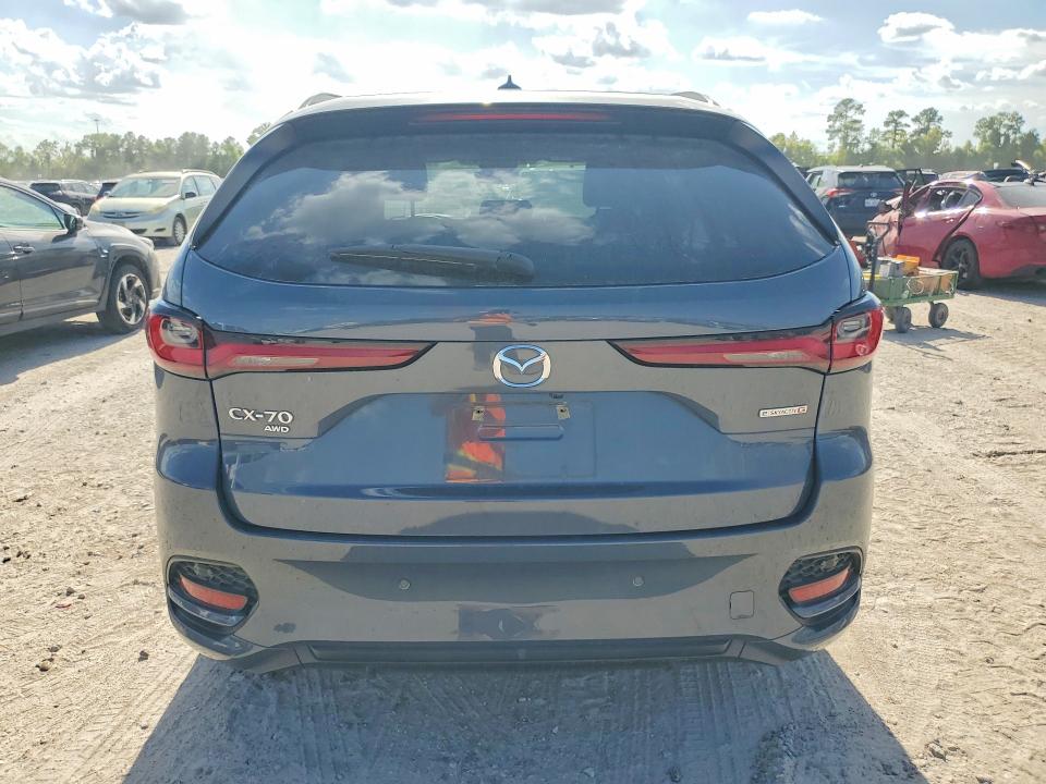 2025 Mazda Cx-70 VIN JM3KJDHC8S1108818 COPART salvage auction — WATER/FLOOD, Tx - Salvage Title-Flood Damage, sold $14,400 on 2026-09-04 (photo 6)