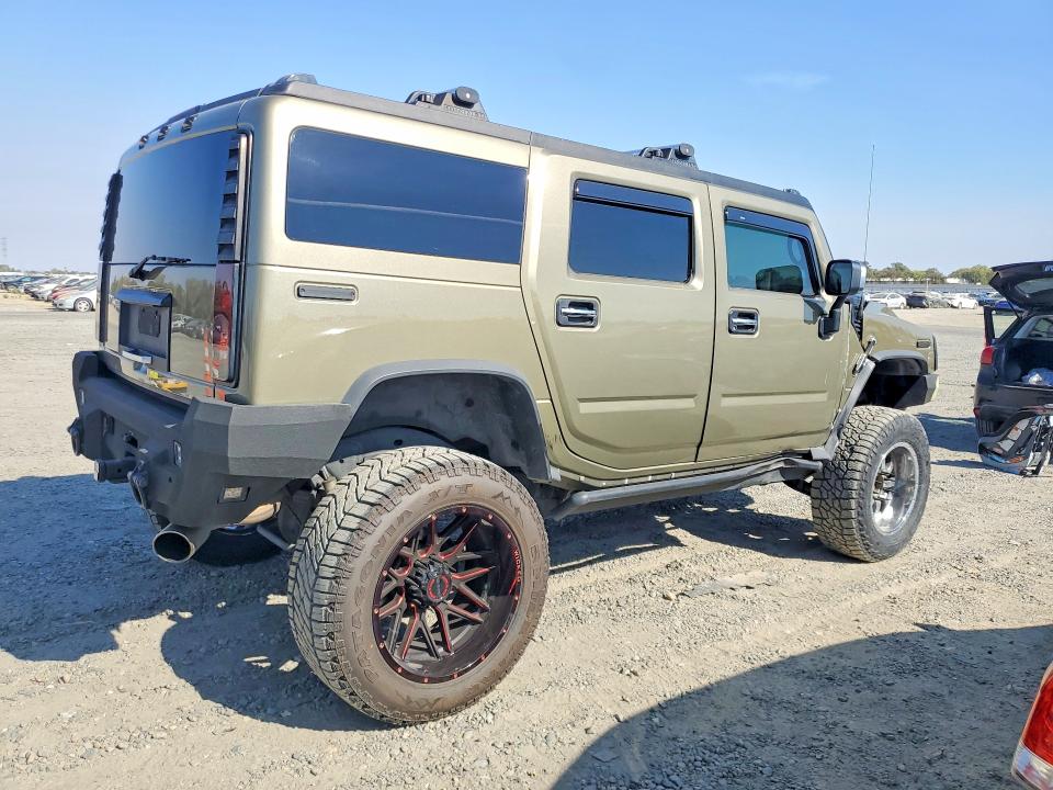 2005 Hummer H2 VIN 5GRGN23U25H104734 COPART salvage auction — SIDE, CA - DLR/DIS/EXP ONLY SALVAGE TITLE, sold $2,000 on 2026-09-10 (photo 3)