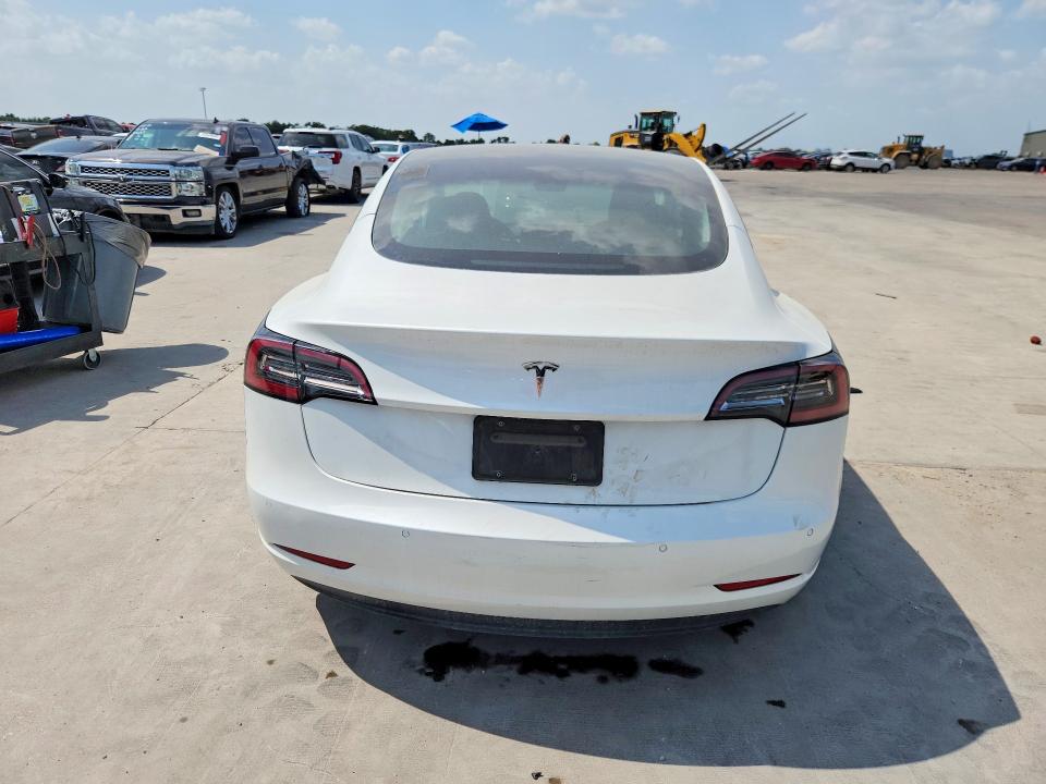 2021 Tesla Model 3 VIN 5YJ3E1EA8MF100280 COPART salvage auction — MINOR DENT/SCRATCHES, SC - CERTIFICATE OF TITLE, sold $11,300 on 2026-09-10 (photo 6)
