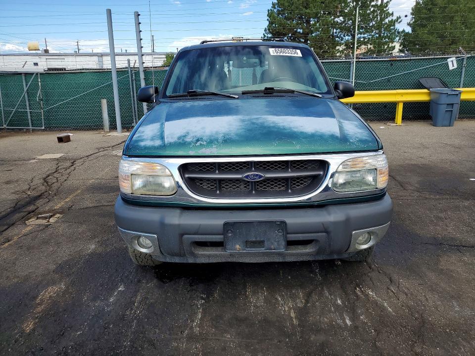 2000 Ford Explorer VIN 1FMDU73E6YZB45987 COPART salvage auction — REAR END, TX - DIS/DLR/EXP ONLY SALVAGE TITLE, sold $0 on 2026-10-20 (photo 5)