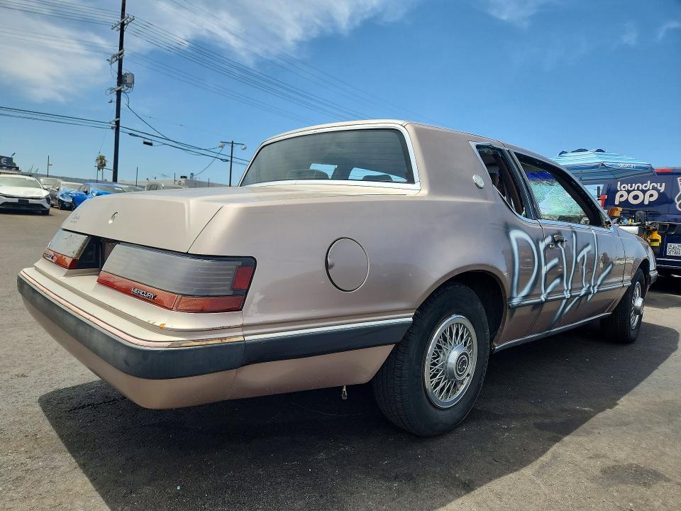 1986 Mercury Cougar VIN 1MEBP92F3GH728237 COPART salvage auction — VANDALISM, CA - DIS/DLR/EXP ONLY CLEAN TITLE, sold $225 on 2026-08-26 (photo 3)