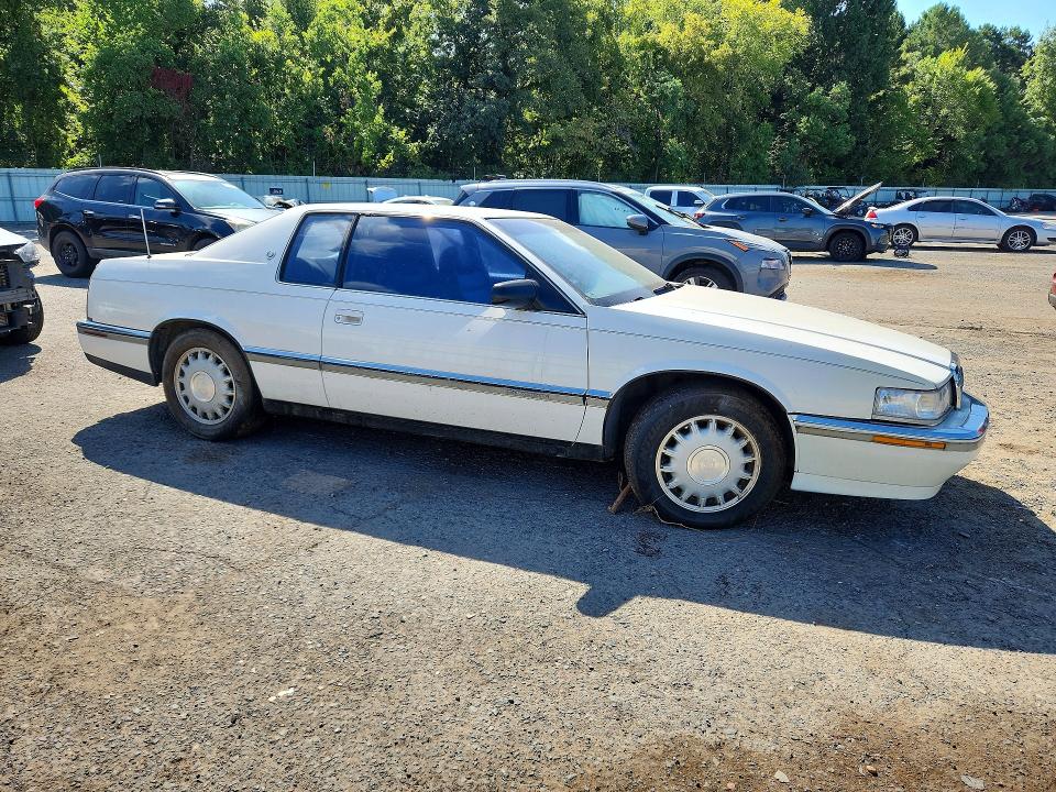 1992 Cadillac Eldorado VIN 1G6EL13B0NU624500 COPART salvage auction — FRONT END, TX - SALVAGE VEHICLE TITLE, sold $575 on 2026-09-10 (photo 4)