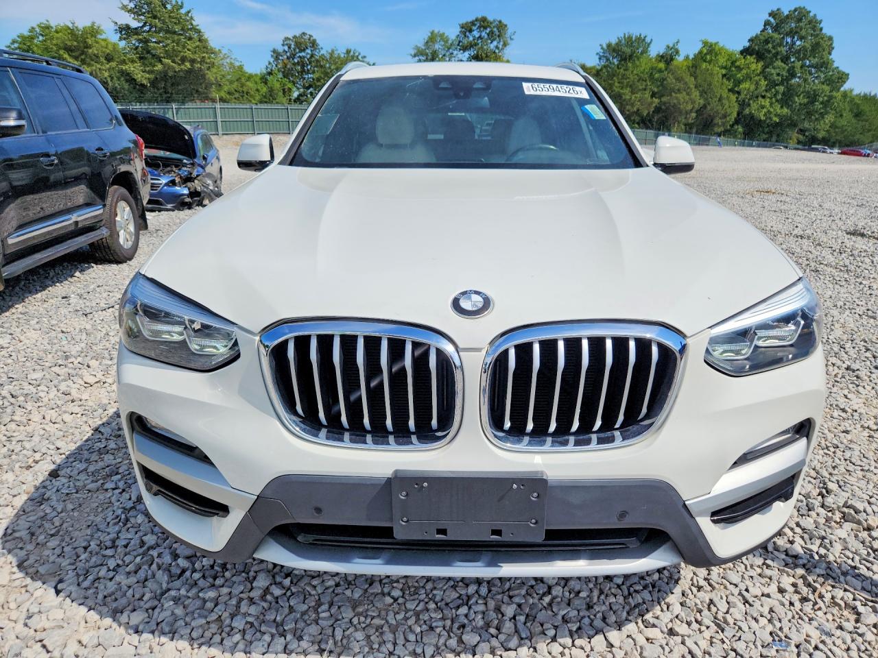 2019 BMW X3 VIN 5UXTR7C53KLE97034 COPART salvage auction — Side, TN - CERTIFICATE OF TITLE, sold $9,100 on 2026-09-11 (photo 5)