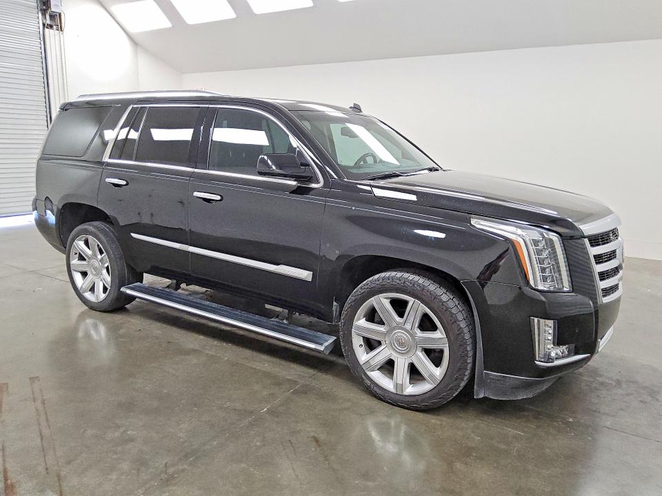 2015 Cadillac Escalade VIN 1GYS4CKJ9FR144004 COPART salvage auction — MECHANICAL, TX - CERTIFICATE OF TITLE, sold $7,900 on 2026-10-06 (photo 4)
