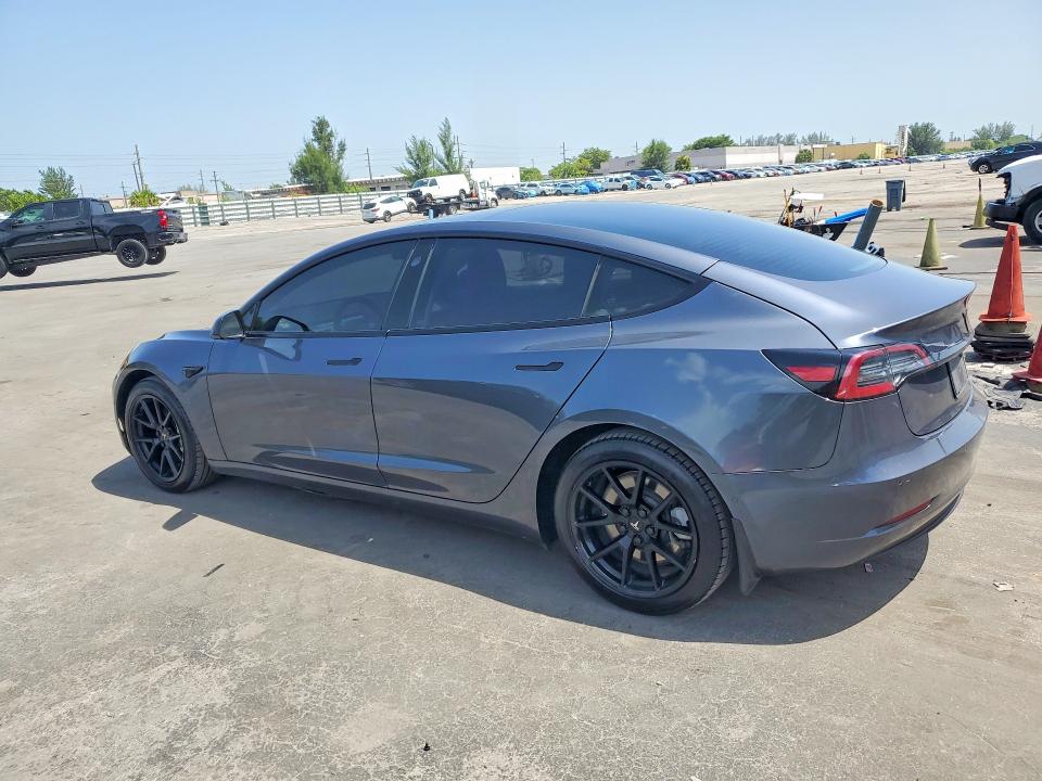 2021 Tesla Model 3 VIN 5YJ3E1EA8MF854022 COPART salvage auction — MINOR DENT/SCRATCHES, Fl - Cert Of Title-Rebuilt, sold $8,600 on 2026-09-09 (photo 2)