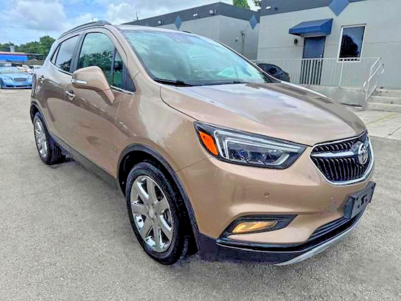 2019 Buick Encore VIN KL4CJCSM3KB734676 COPART salvage auction — Water/Flood, FL - CERT OF TITLE-REBUILT (P), sold $6,700 on 2026-09-18 (photo 4)