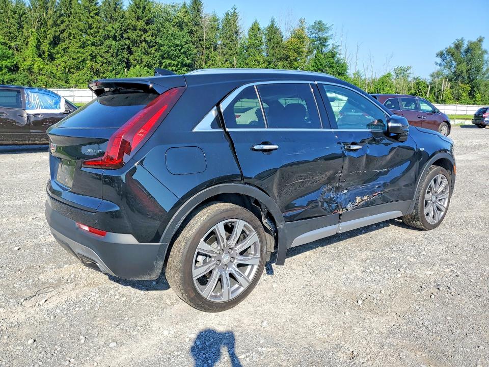 2023 Cadillac Xt4 VIN 1GYFZDR42PF221520 COPART salvage auction — SIDE, Ny - Mv-907A Salvage Certificate, sold $8,900 on 2026-08-24 (photo 3)