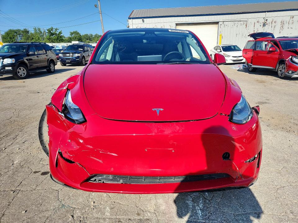 2022 Tesla Model y VIN 7SAYGDEE8NF325940 COPART salvage auction — FRONT END, Md - Certificate Of Title, sold $11,500 on 2026-10-07 (photo 5)